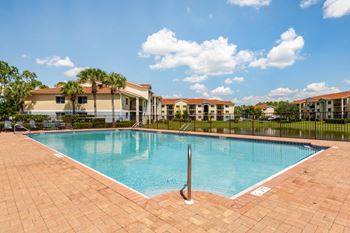 Swimming pool with sun deck seating